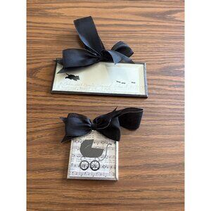 Set of two metal and glass wall hangings with ribbon